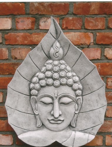 Boeddha hoofd in blad